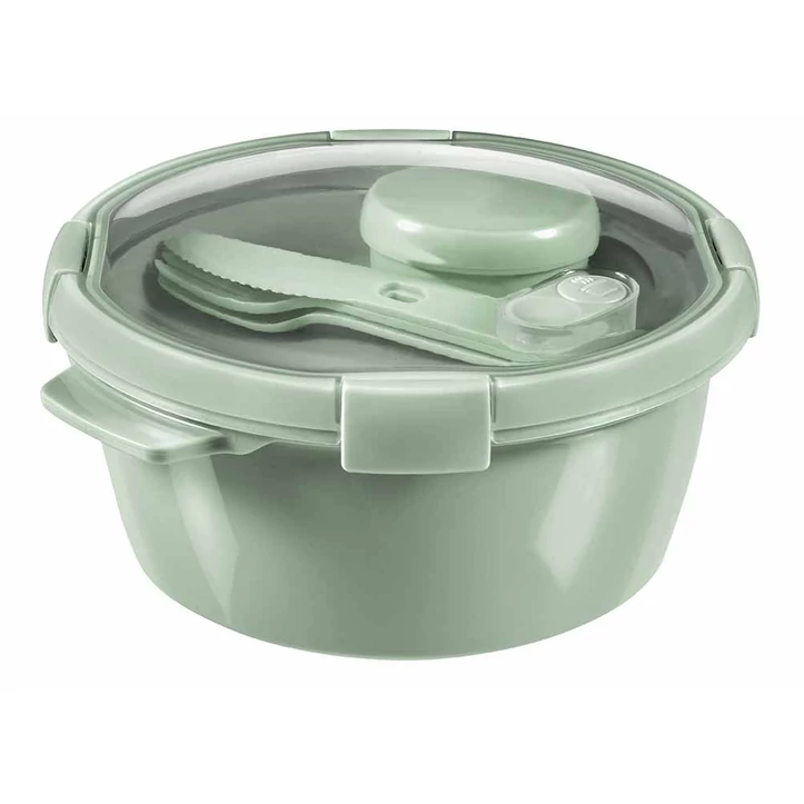 Kerek, menta színű CURVER 'SMART ECO' ételtartó, 1,6L űrtartalommal, a tetőn szellőztető szeleppel és evőeszközkészlettel. Az átlátszó fedél lehetővé teszi a tartalom könnyű áttekintését, mosogatógépben mosható.