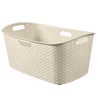 Kép 1/3 - Krémszínű CURVER 'MY STYLE' rattan hatású ruháskosár, 47 literes kapacitással, modern fonott mintázattal. Két oldalán kényelmes fogantyúkkal, könnyű, strapabíró anyagból készült, könnyen tisztítható.